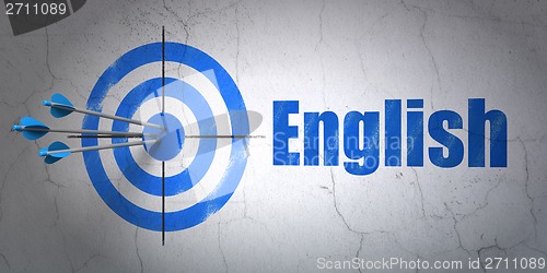 Image of Education concept: target and English on wall background