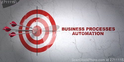 Image of Business concept: target and Business Processes Automation on wall background