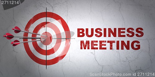 Image of Finance concept: target and Business Meeting on wall background