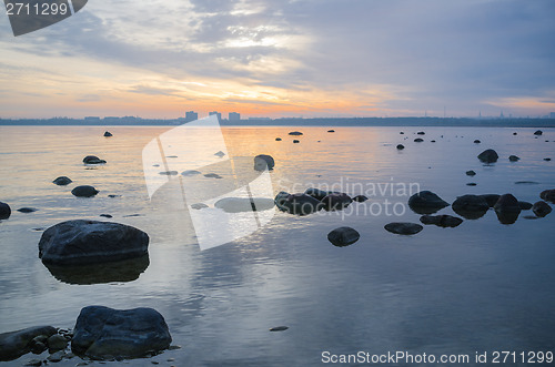 Image of Beautiful sunrise on the sea. Views of Tallinn.