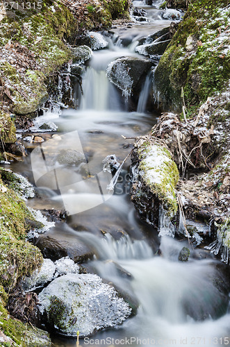 Image of Small creek with a waterfall close up