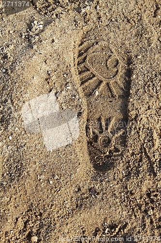 Image of Boot print on the sand