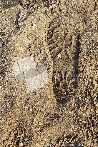 Image of Boot print on the sand