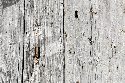 Image of Very old wooden door with handle