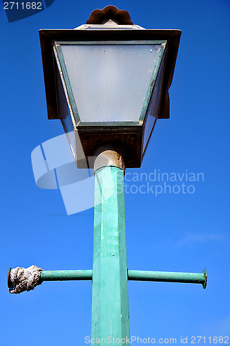 Image of  street lamp and a bulb in the sky arrecife teguise 
