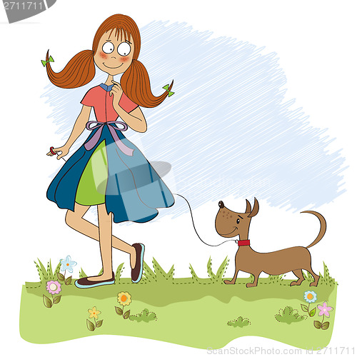 Image of Girl walking her little dog