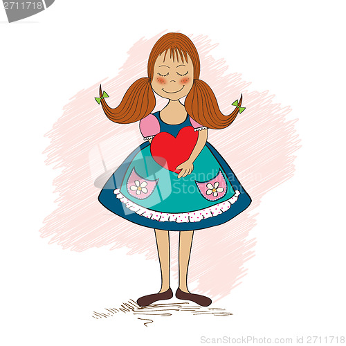 Image of Girl in love holding a heart