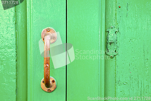 Image of spain   brass knocker  abstract door wood in the 