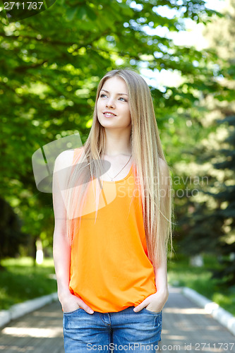 Image of Pensive young woman outdoors.