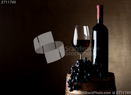 Image of Juicy grape and wine with barrel