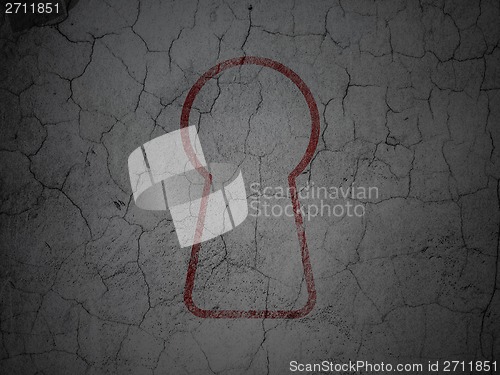 Image of Security concept: Keyhole on grunge wall background