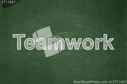 Image of Finance concept: Teamwork on chalkboard background
