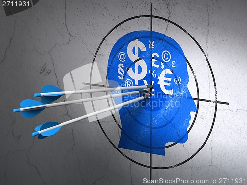 Image of Education concept: arrows in Head With Finance Symbol target on wall background