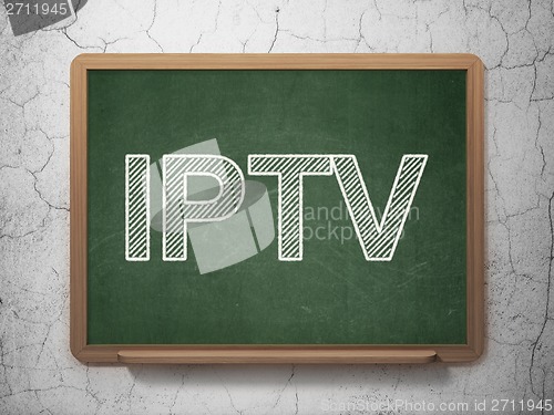 Image of Web development concept: IPTV on chalkboard background