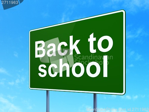 Image of Education concept: Back to School on road sign background