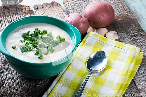 Image of Bowl of creamy clam chowder.  Seafood Chowder.