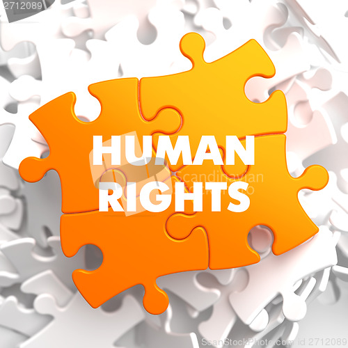 Image of Human Rights on Orange Puzzle.
