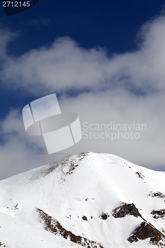 Image of Winter mountains and off-piste slope at nice day