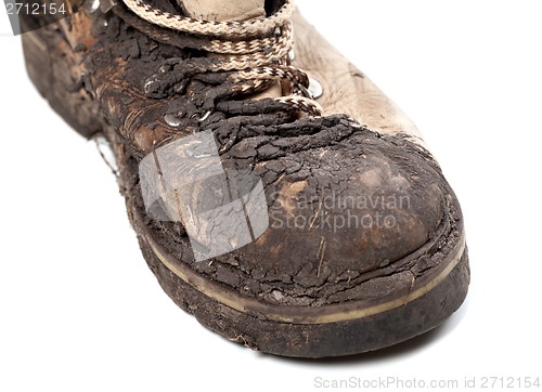 Image of Part of old dirty hiking boot on white background