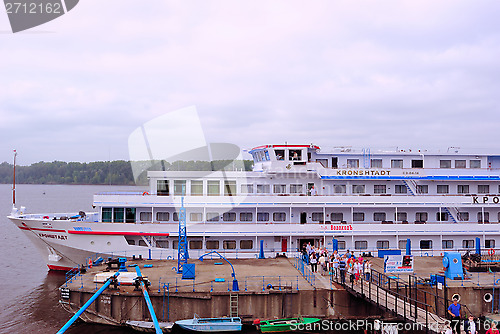 Image of Tourists Come Ashore from the Cruise Liner