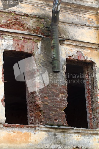 Image of empty window apertures in the old house