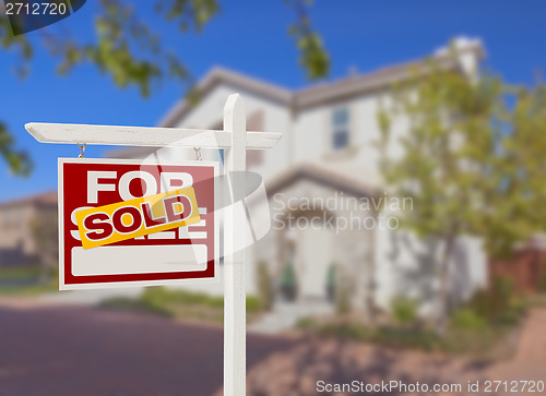 Image of Sold Home For Sale Sign in Front of New House