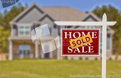 Image of Sold Home For Sale Sign in Front of New House