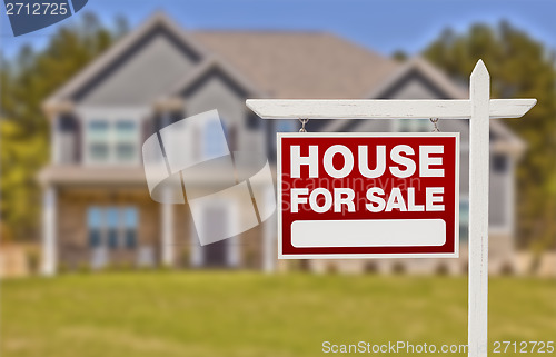 Image of Home For Sale Sign in Front of New House