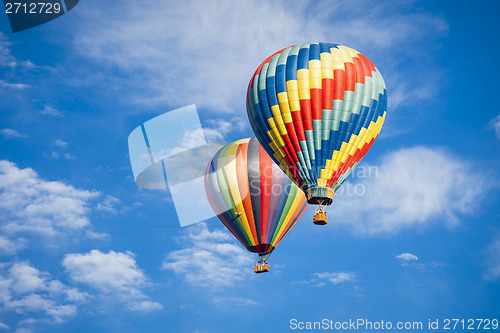 Image of Beautiful Hot Air Balloons Against a Deep Blue Sky