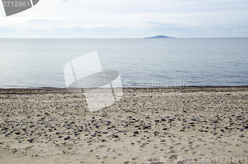 Image of View at an island from a sandy beach