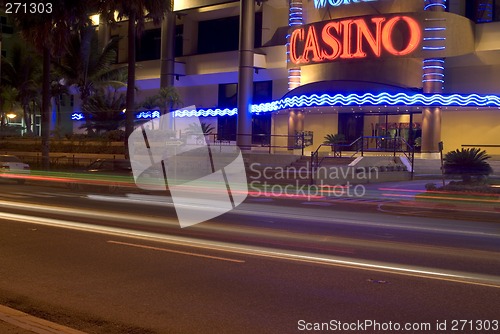 Image of casino with light streaks malecon