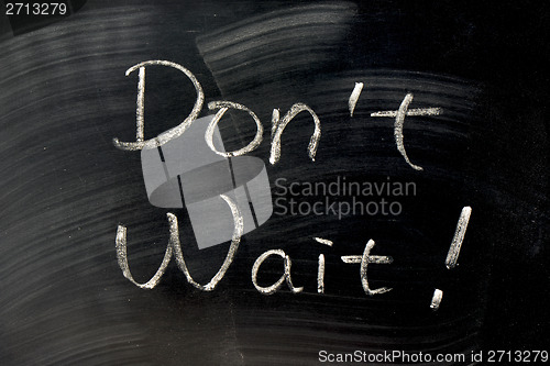 Image of Don't Wait - words written on a blackboard