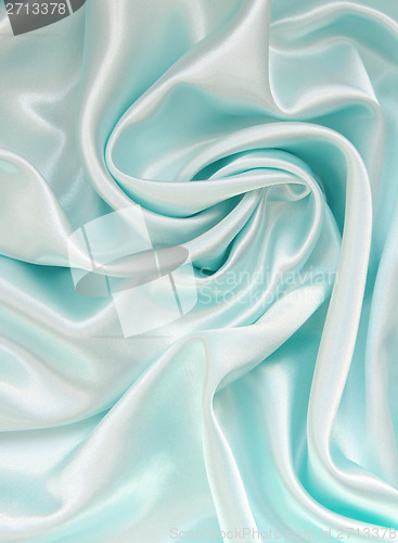 Image of Smooth elegant blue silk as background 