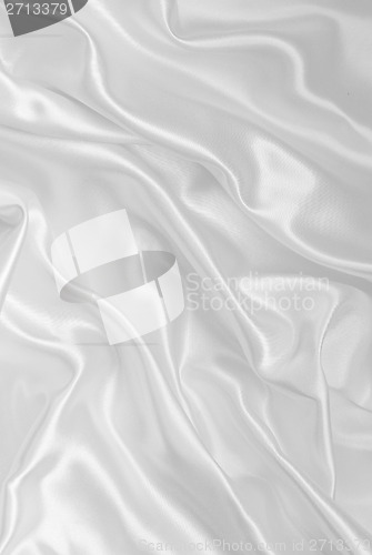 Image of Smooth elegant white silk as background 