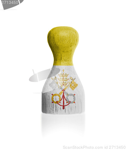 Image of Wooden pawn with a flag painting