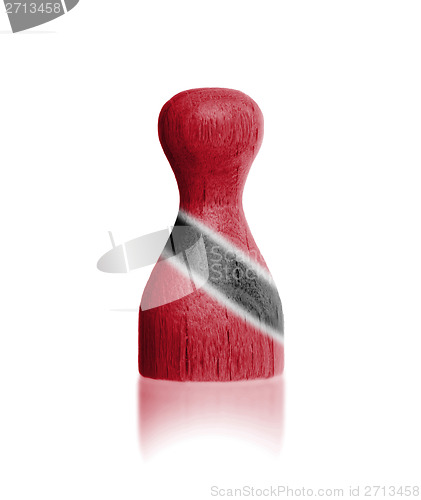 Image of Wooden pawn with a flag painting