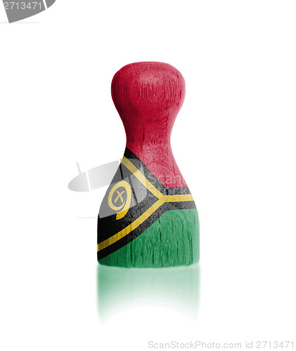 Image of Wooden pawn with a flag painting