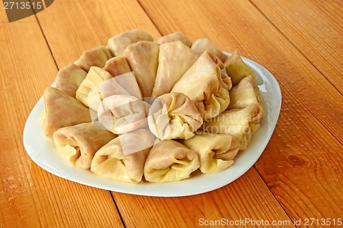 Image of Stuffed cabbage rolls on the wooden table