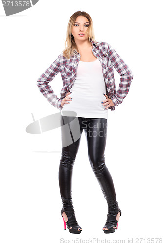 Image of Young woman wearing checked shirt