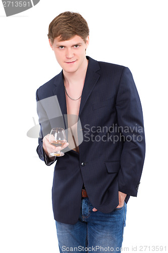 Image of Young man posing with a glass of whiskey