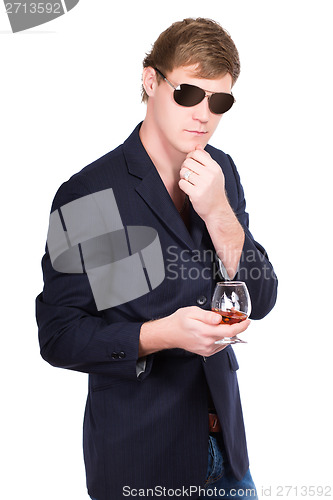 Image of Man in sunglasses and jacket