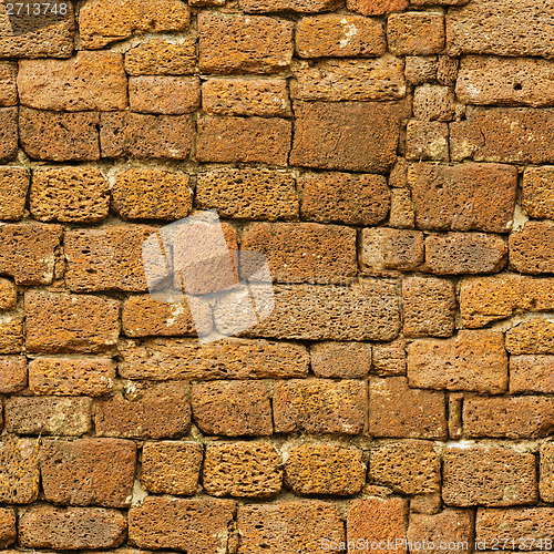 Image of Seamless pattern - old brown rough natural stone wall