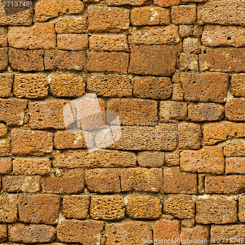 Image of Seamless pattern - old brown rough natural stone wall