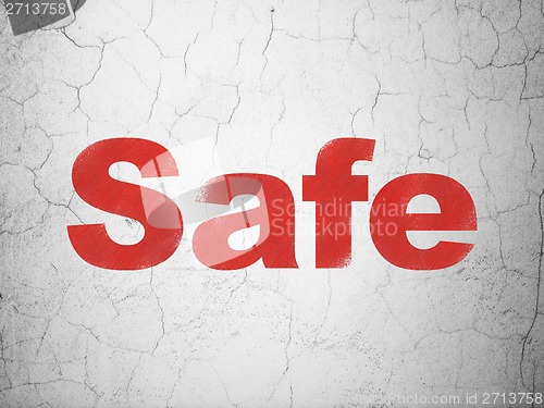 Image of Protection concept: Safe on wall background