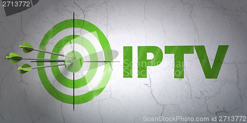 Image of Web development concept: target and IPTV on wall background