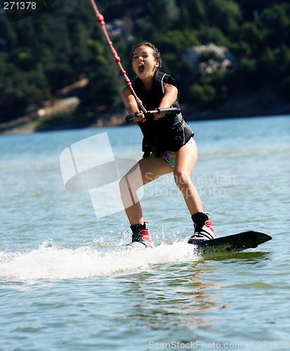 Image of Girl wakeboarding