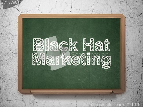 Image of Finance concept: Black Hat Marketing on chalkboard background
