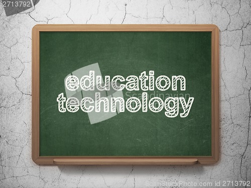Image of Education concept: Education Technology on chalkboard background