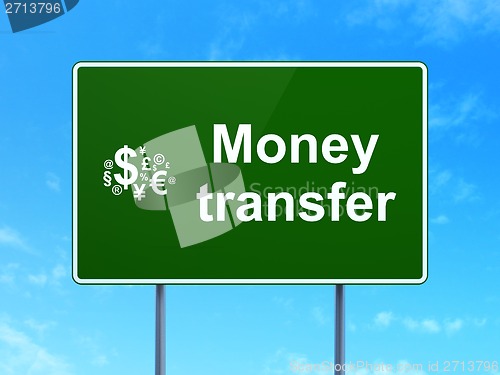 Image of Business concept: Money Transfer and Finance Symbol on road sign background