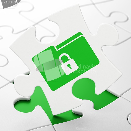 Image of Business concept: Folder With Lock on puzzle background